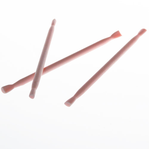 three plastic tools with  ends that create eye shapes for fondant a clay figure making.