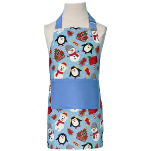blue apron with christmas characters like penguins and snowmen
